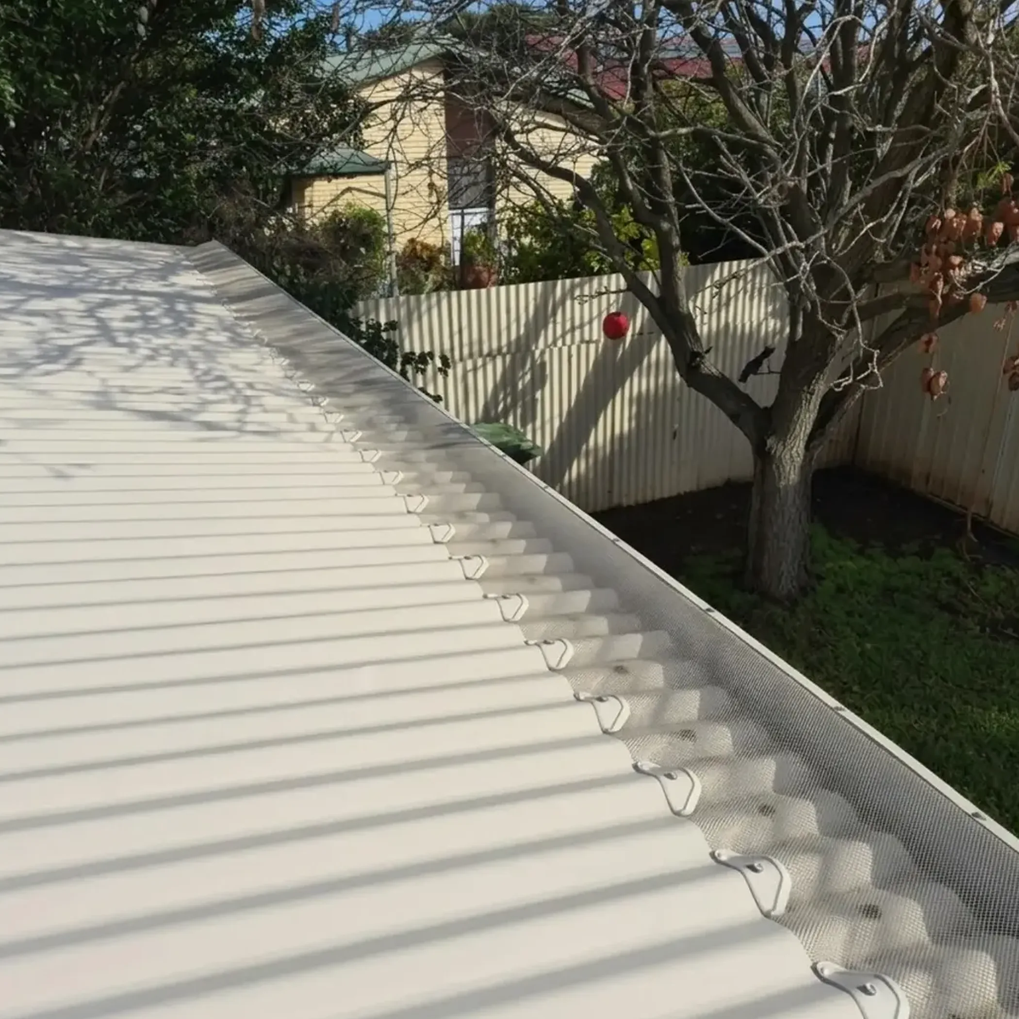 clean gutter guard installation on home