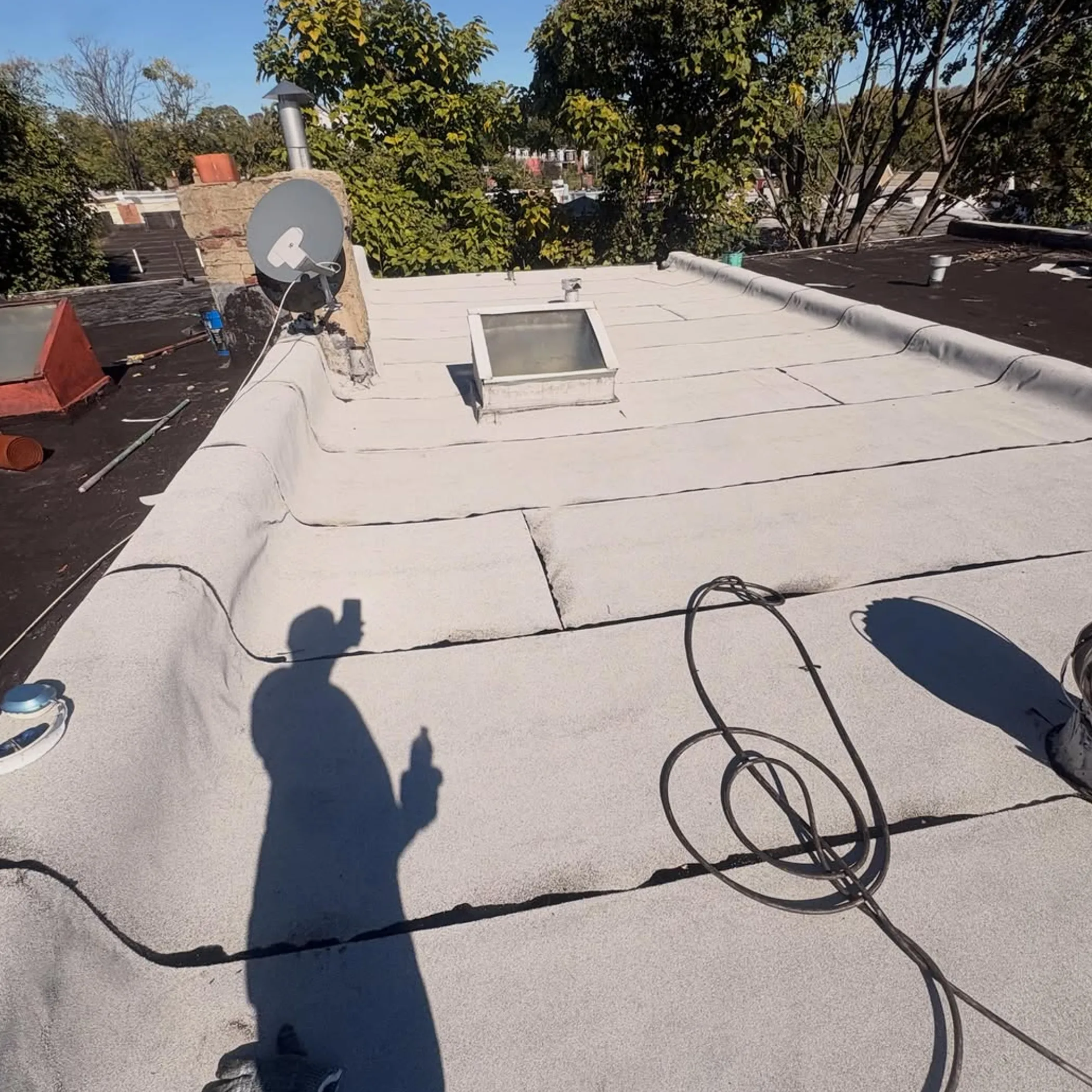 elevated roofing work in strong sunlight