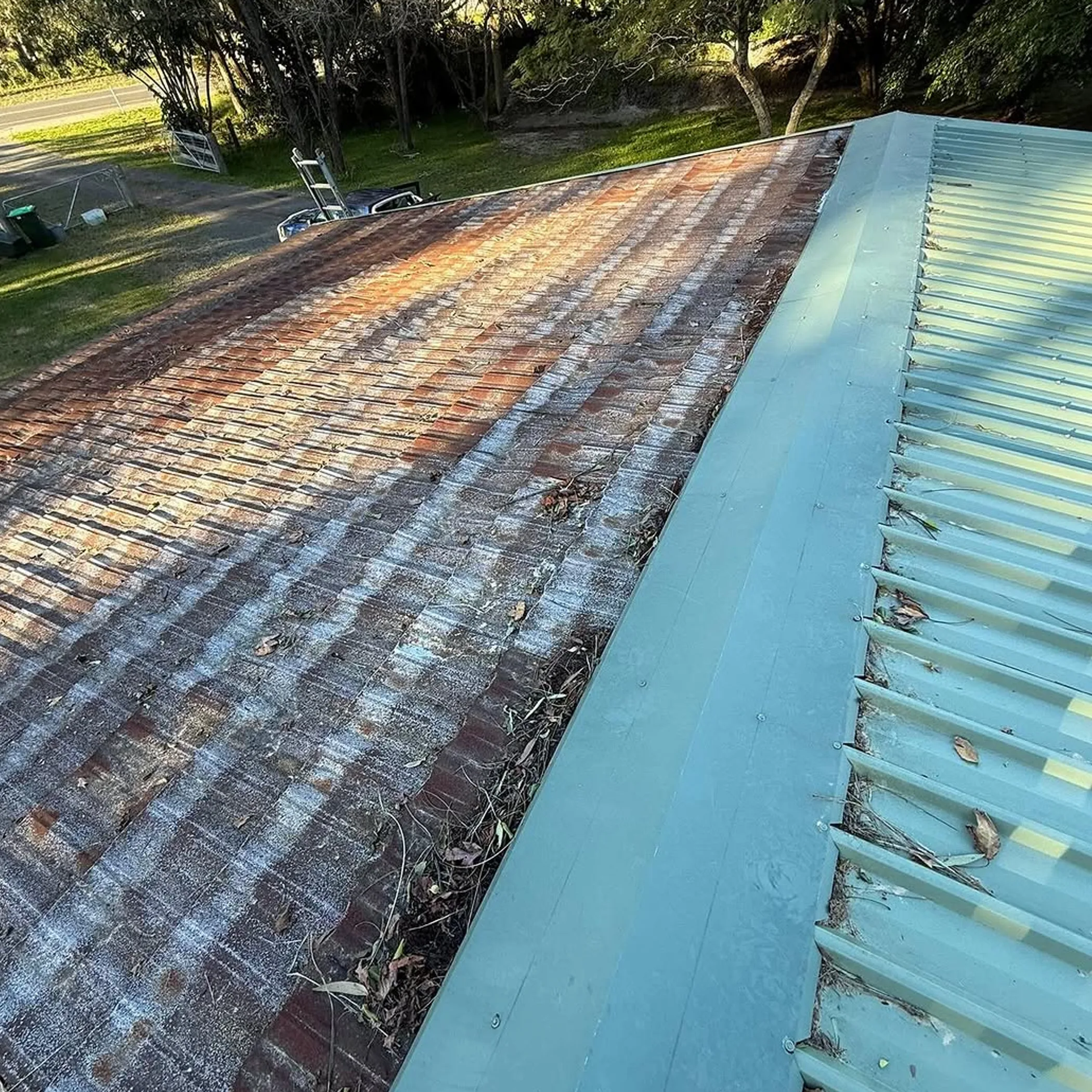 damaged roof with storm debris